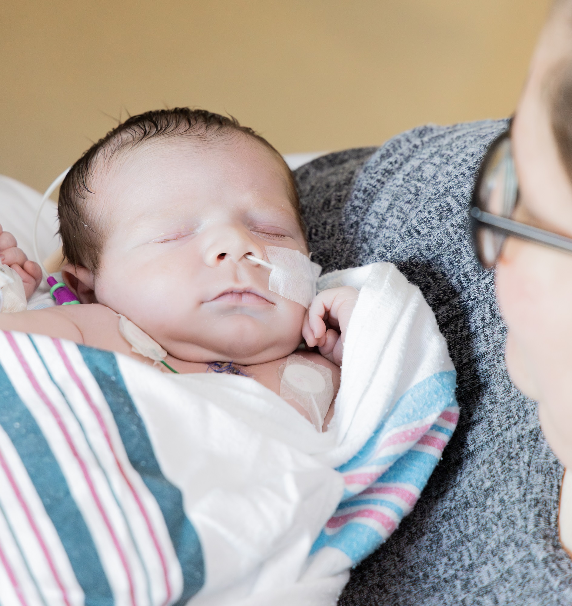 Megan Wild holding Luciano Reynaga III